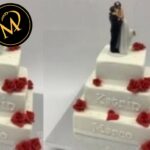 3-stöckige Hochzeitstorte eckig mit roten Rosen - Rezept Marcel Paa